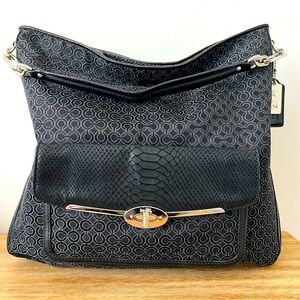 Like New. Coach Purse with Teal Lining.